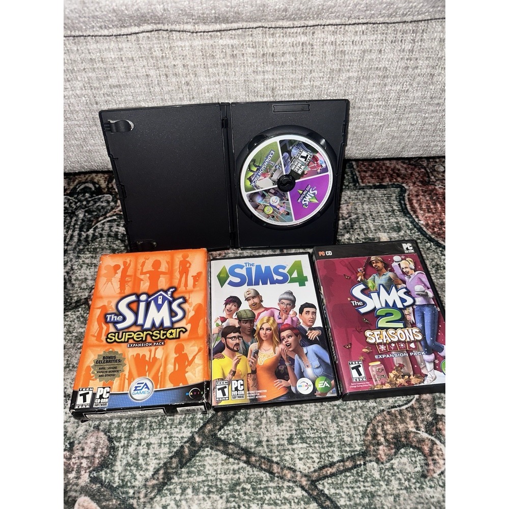 Lot Of 4 PC‎ Games - The Sims 2,3,4 Expansion Packs, Superstar, Seasons…